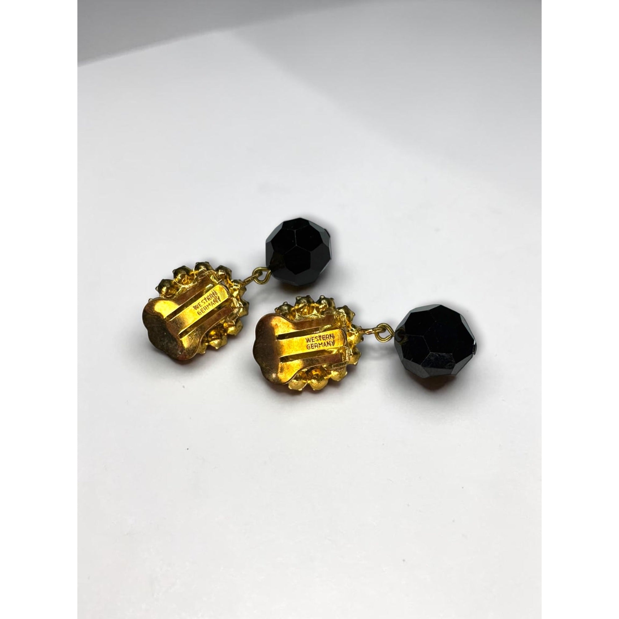 West Germany Black Faceted Crystal Dangle Clip Earrings Gold Tone 1960s Vintage