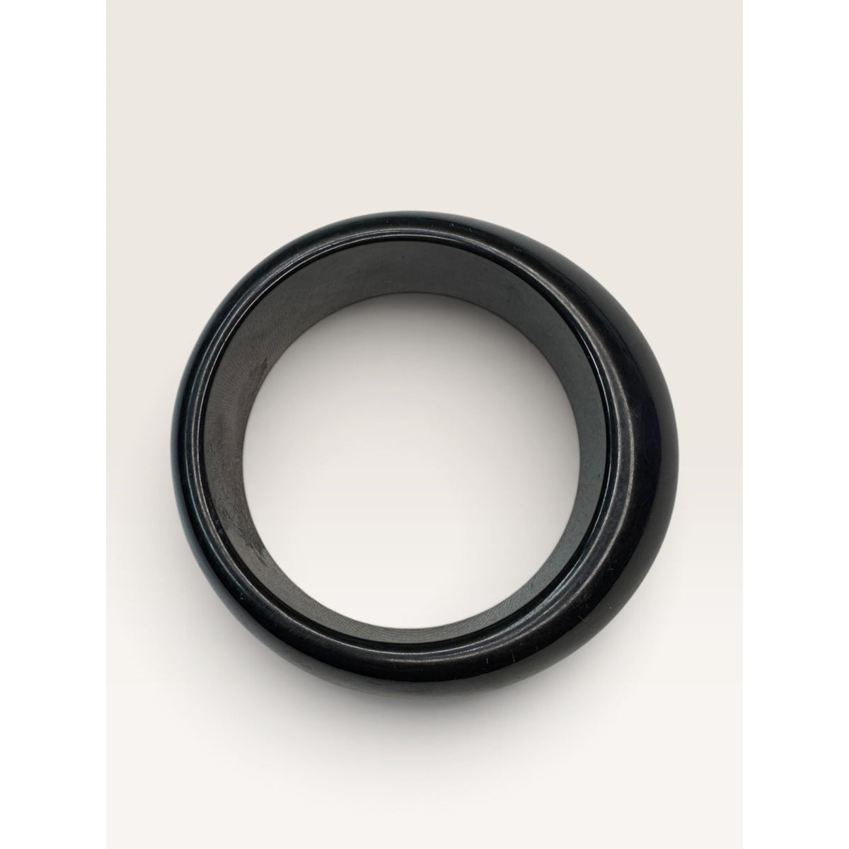 1980s Jet Black Chunky Asymmetrical Domed Tapered Bangle Bracelet 7.75"