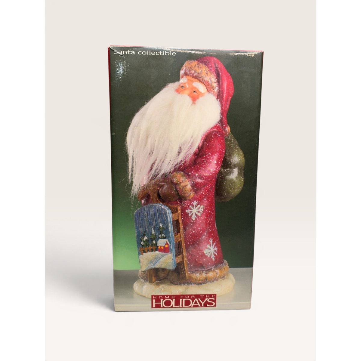 Home for the Holidays 10 Inch Folk Art Santa Figurine with Sled