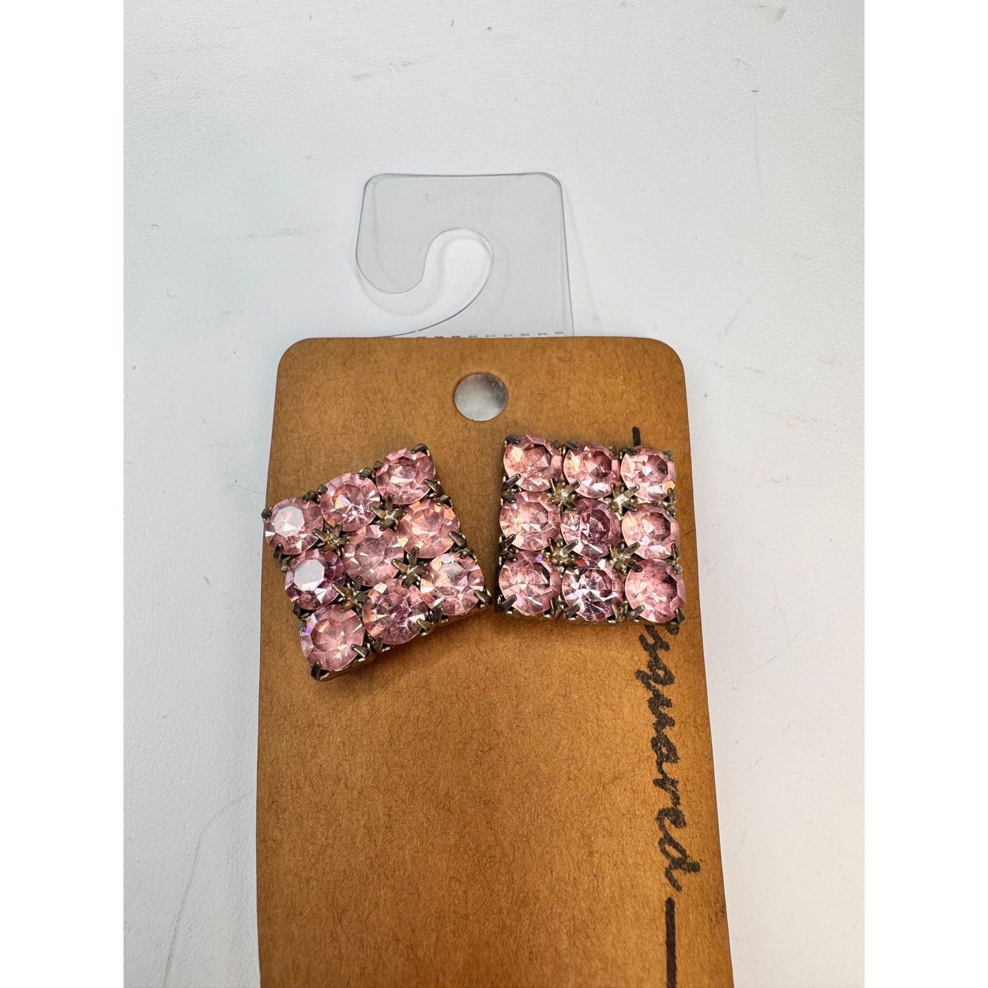 silver tone prong set pink crystal pierced post earrings