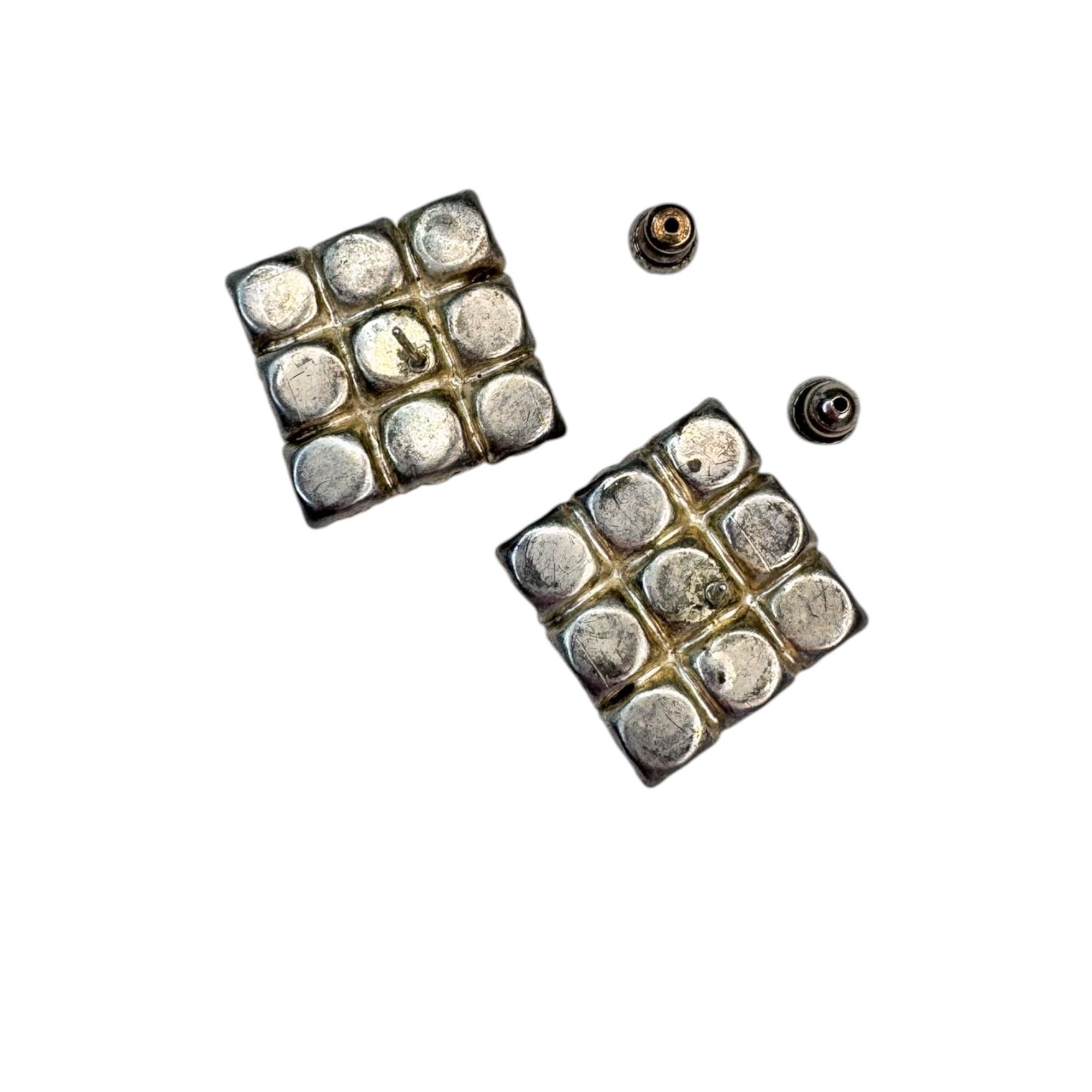 silver tone prong set pink crystal pierced post earrings