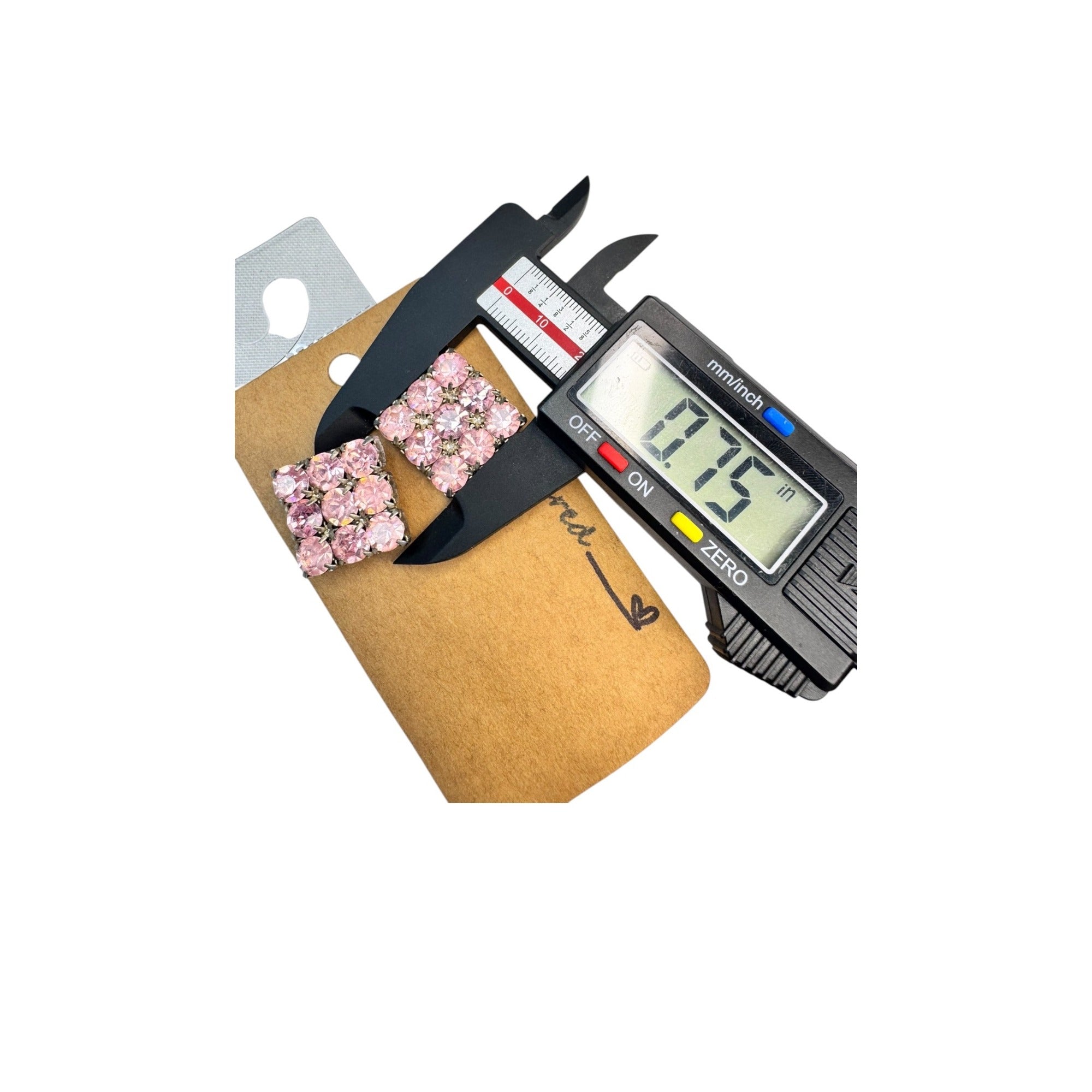 silver tone prong set pink crystal pierced post earrings