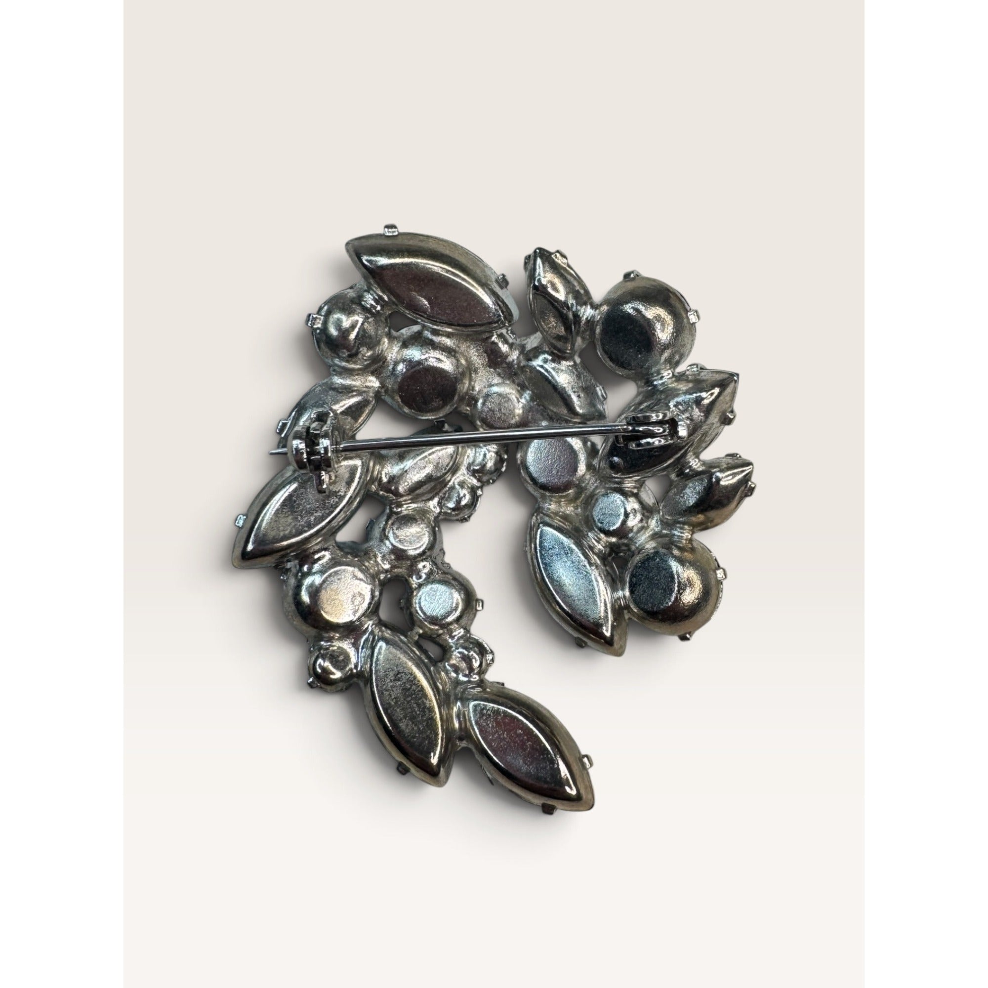 1950s Mid Century Blue Rhinestone UV Reactive Glow Swirl Brooch 1.96" Vintage