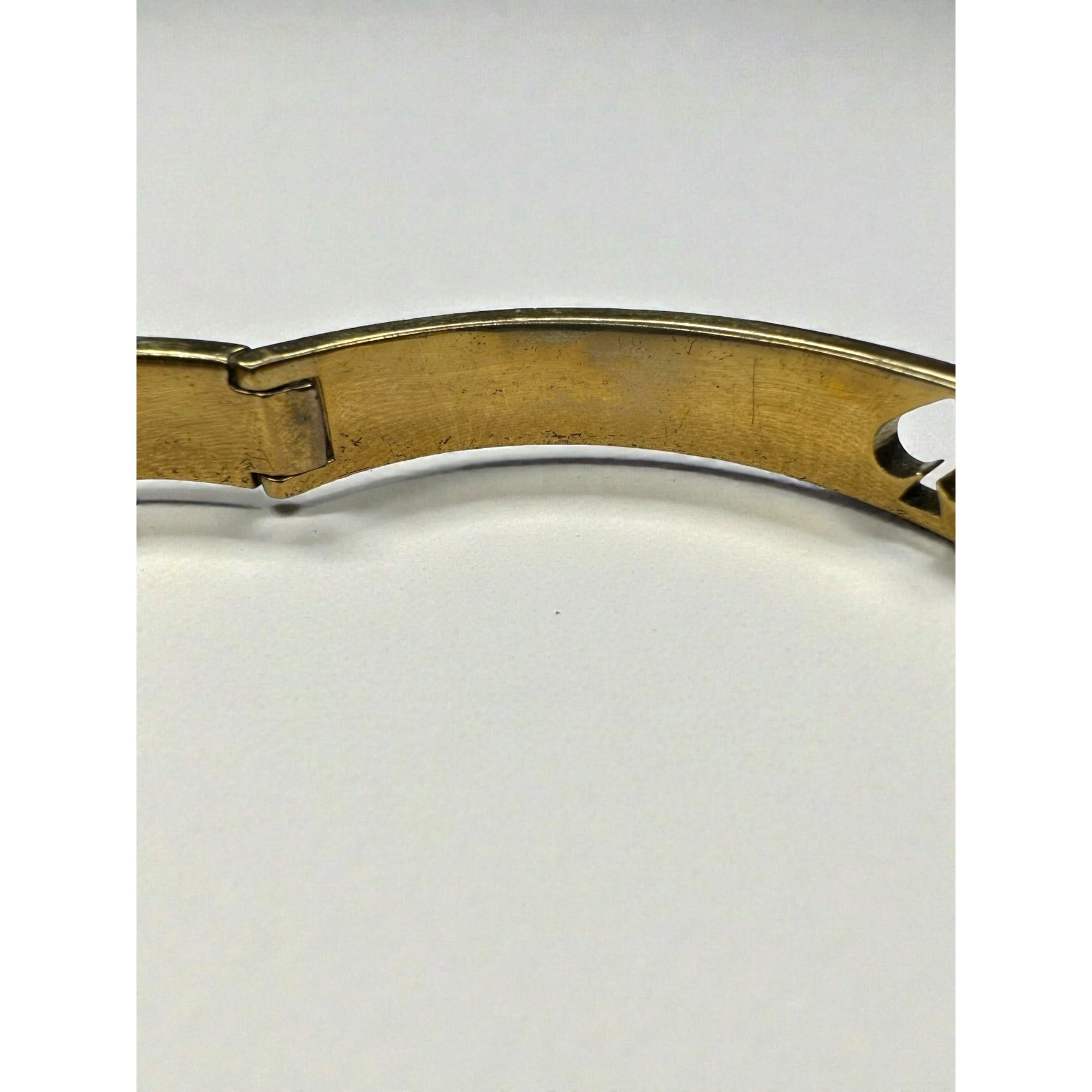 Kate Spade New York Black Enamel Spade Logo Gold Tone Hinged Bangle Bracelet