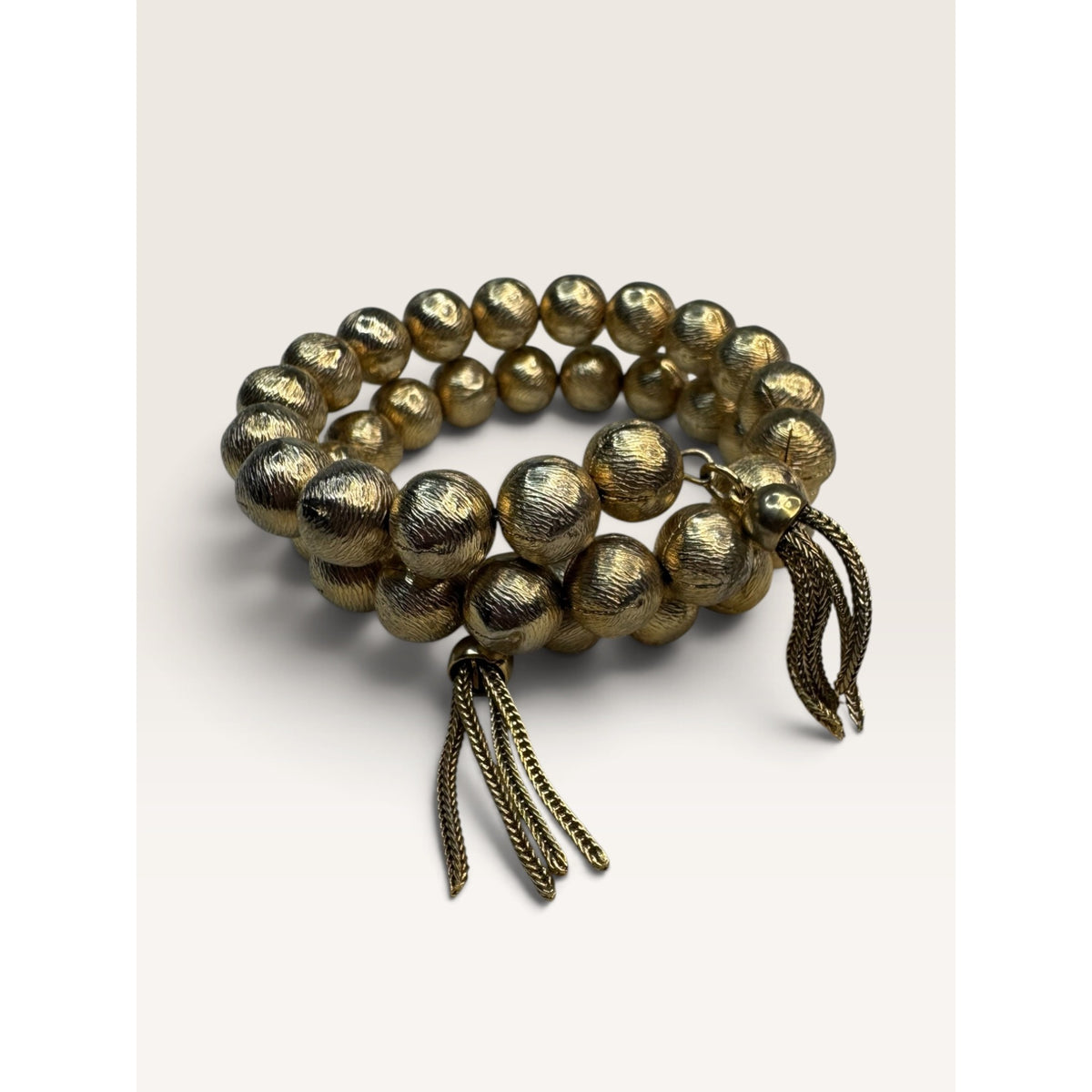 1960s Textured Gold Tone Brushed Ball Bead Wrap Memory Wire Tassel Bracelet