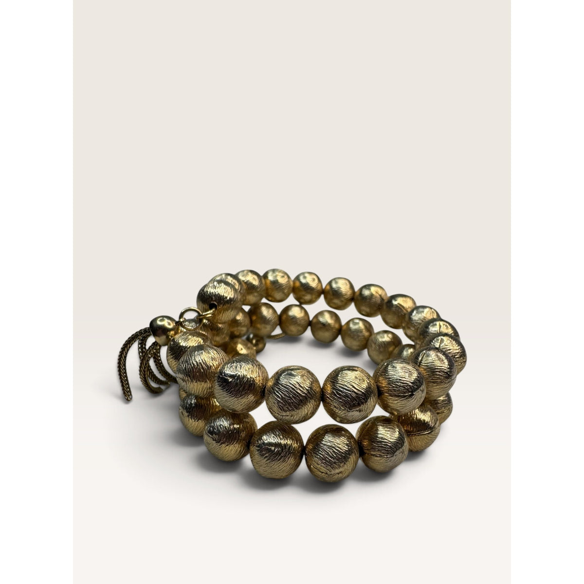 1960s Textured Gold Tone Brushed Ball Bead Wrap Memory Wire Tassel Bracelet