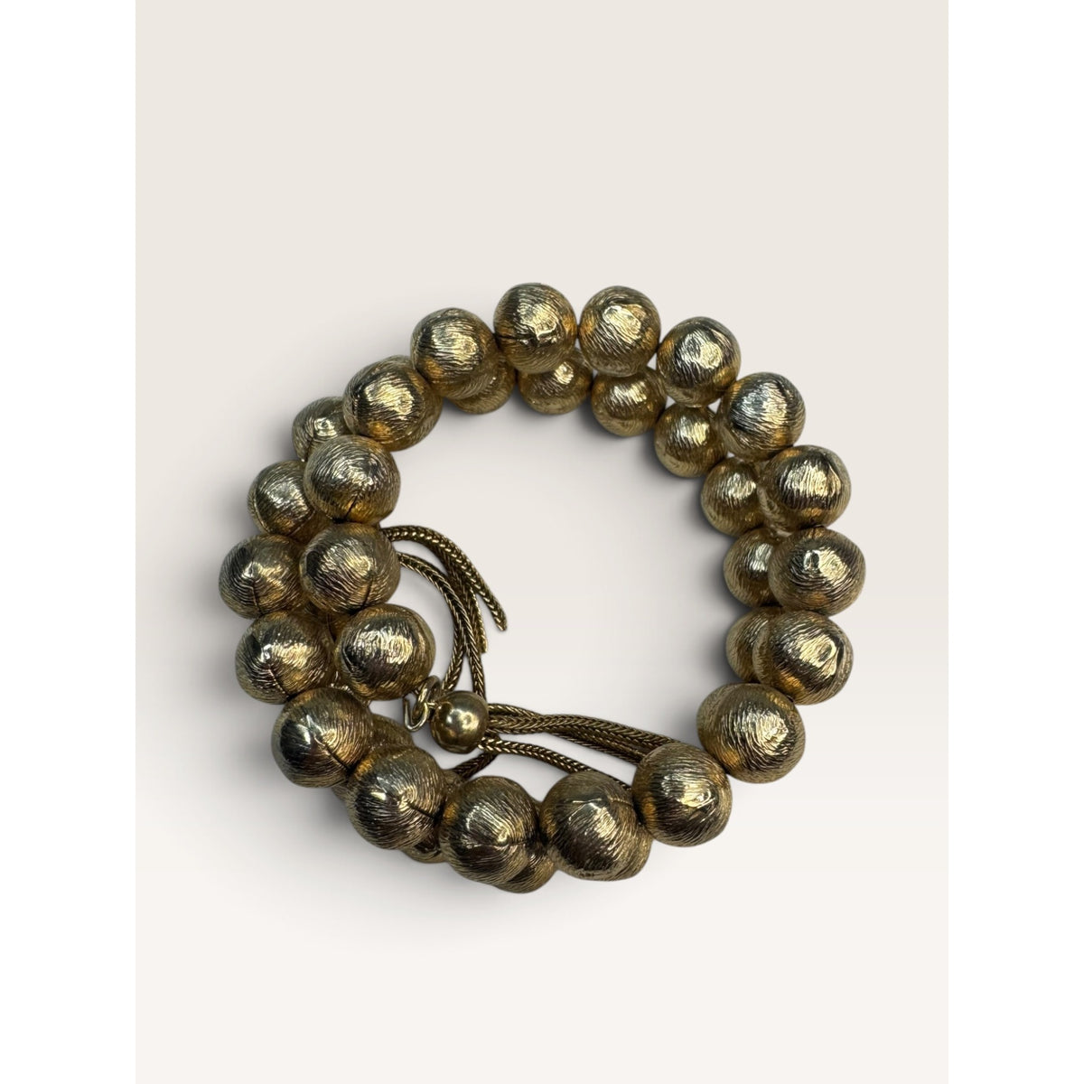 1960s Textured Gold Tone Brushed Ball Bead Wrap Memory Wire Tassel Bracelet